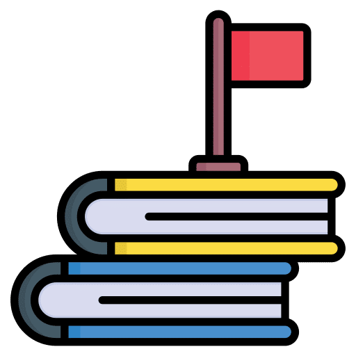 Zwei Bücher mit einer Flagge – symbolisiert Fortschritt im Lernen